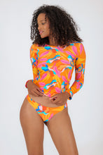 Load image into Gallery viewer, Model Front: Rio De Sol Top Top Orange-Bloom Rash-Guard

